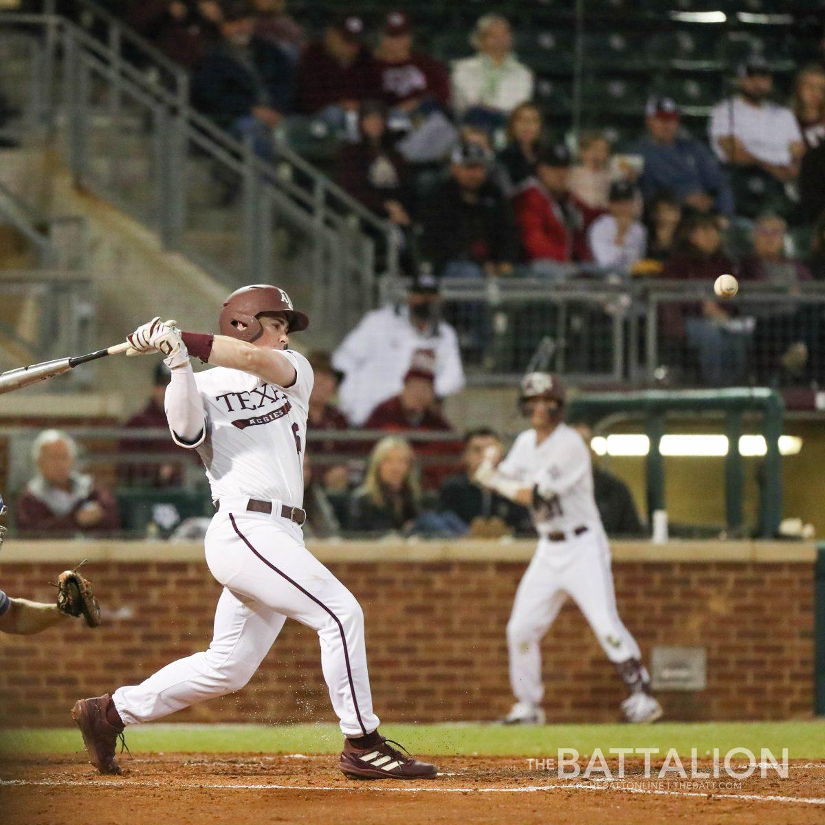 Sophomore second baseman Ryan Targac (16) hits the ball in Blue Bell Park on Tuesday, Mar. 1, 2022.