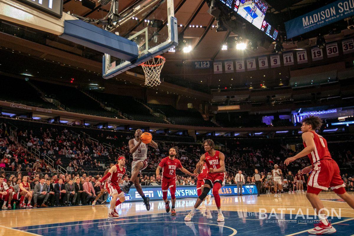Sophomore guard Hassan Diarra (5) jumps to shoot on the Washington State basket in Madison Square Garden on Tuesday, Mar. 29, 2022.