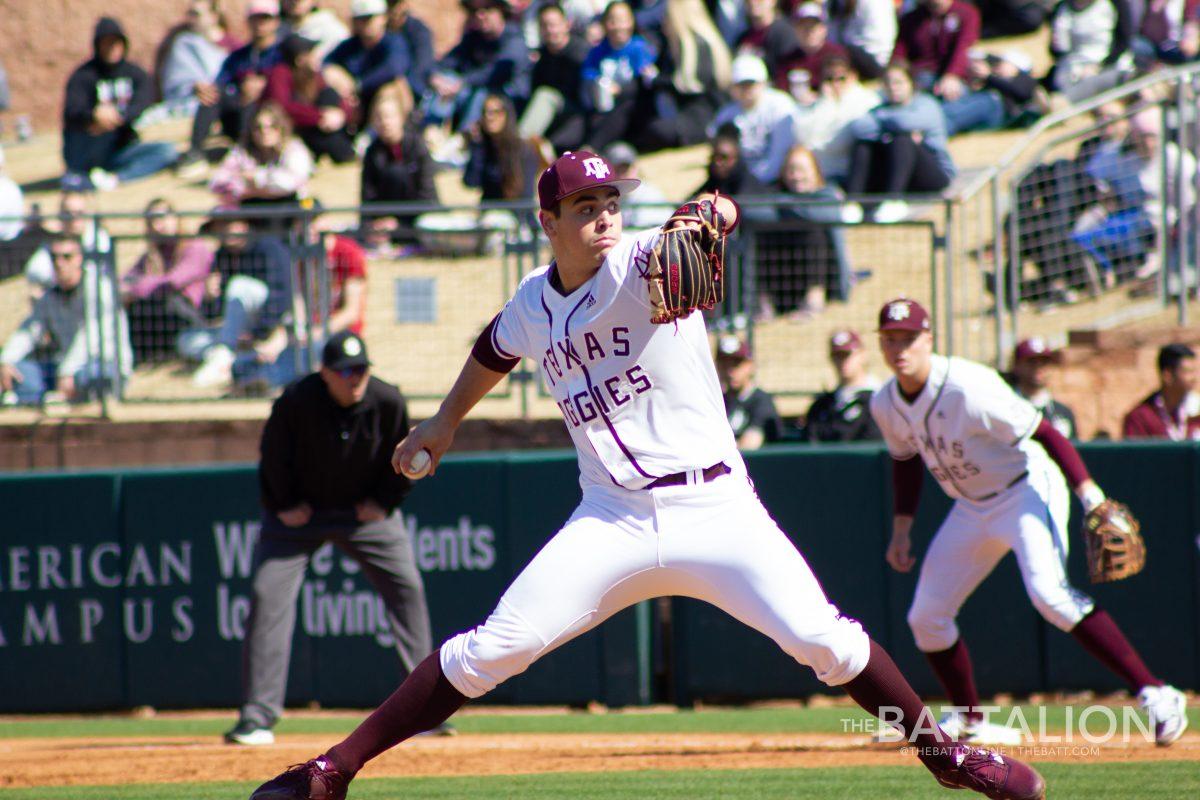 Junior pitcher Micah Dallas (34) pitches while sophomore infielder/outfielder Jack Moss (9) watches at Olsen Field at Blue Bell Park on Sunday, Feb. 27, 2022.