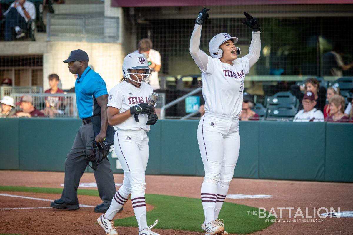 Senior infielder Haley Lee (25) celebrates after scoring a run at Davis Diamond on Friday, April 22, 2022.