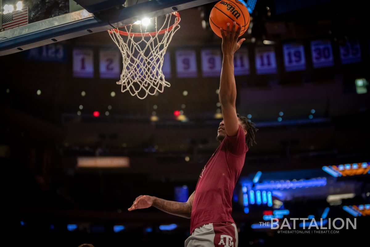 <p>Fifth-year guard Quenton Jackson (3) shoots a layup during practice before tipoff at Madison Square Garden on Thursday, Mar. 31, 2022.</p>