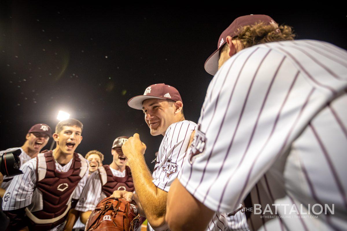 Graduate pitcher Jacob Palisch (33) eats the Pringle at Olsen Field on Friday, April 22, 2022.