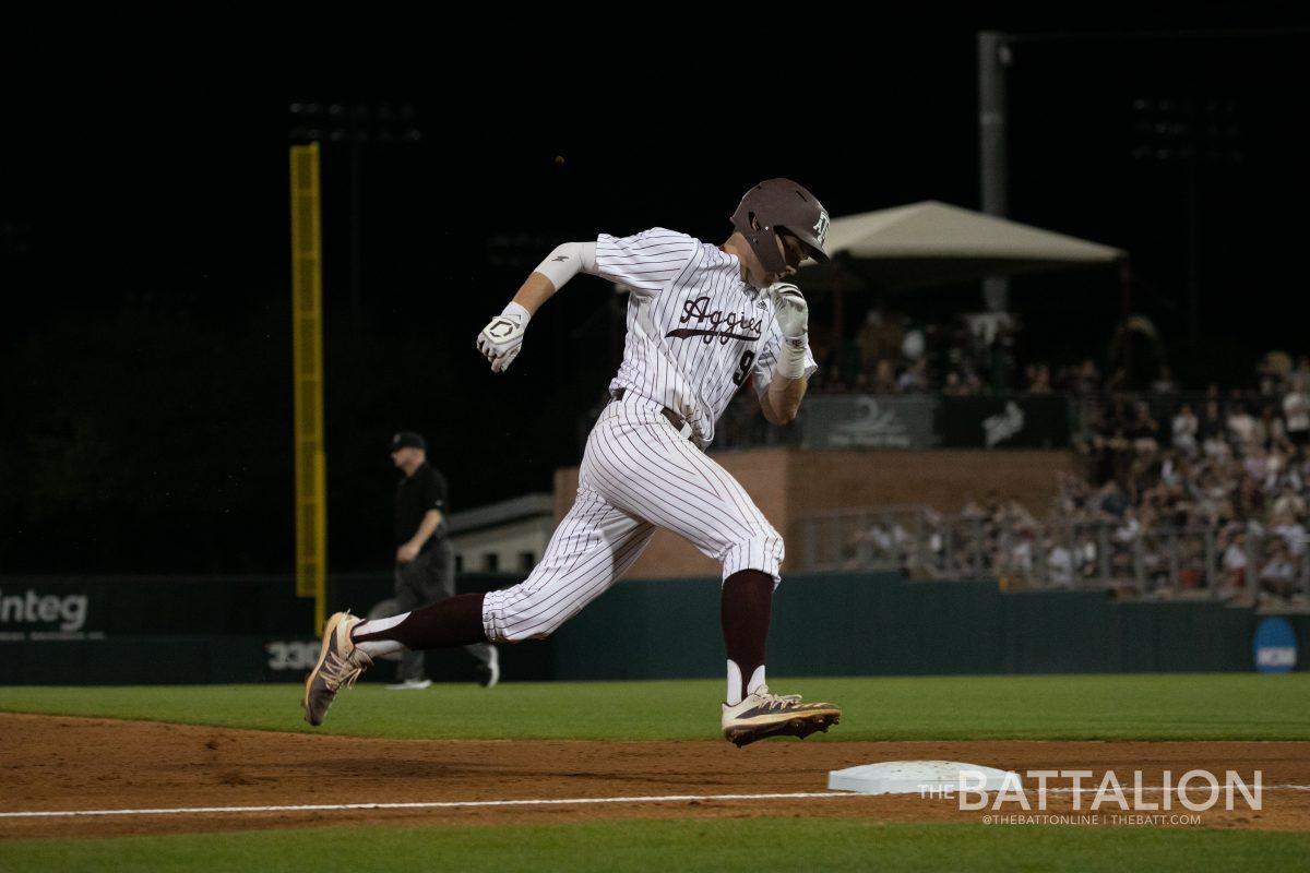 Sophomore first baseman Jack Moss (9) rounds third base&#160;at Olsen Field in Blue Bell Park on Friday, March 25, 2022.