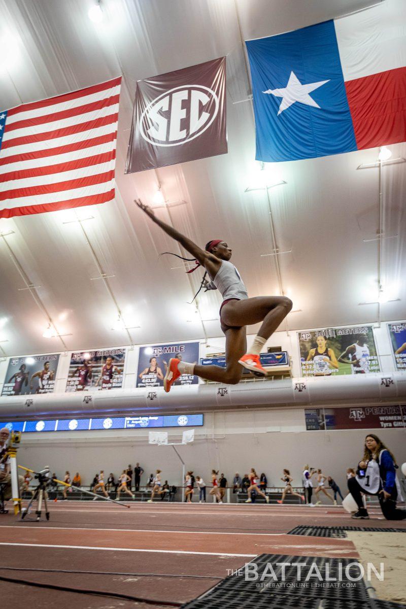 Fifth-year Deborah Acquah midair during the womens long jump competition at the SEC Indoor Track and Field Championship on Friday, Feb. 25, 2022.