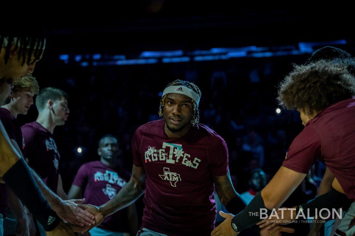 Junior guard Tyrece Radford (23) as the Aggies' starting lineup is announced at Madison Square Garden on Thursday, Mar. 31, 2022.