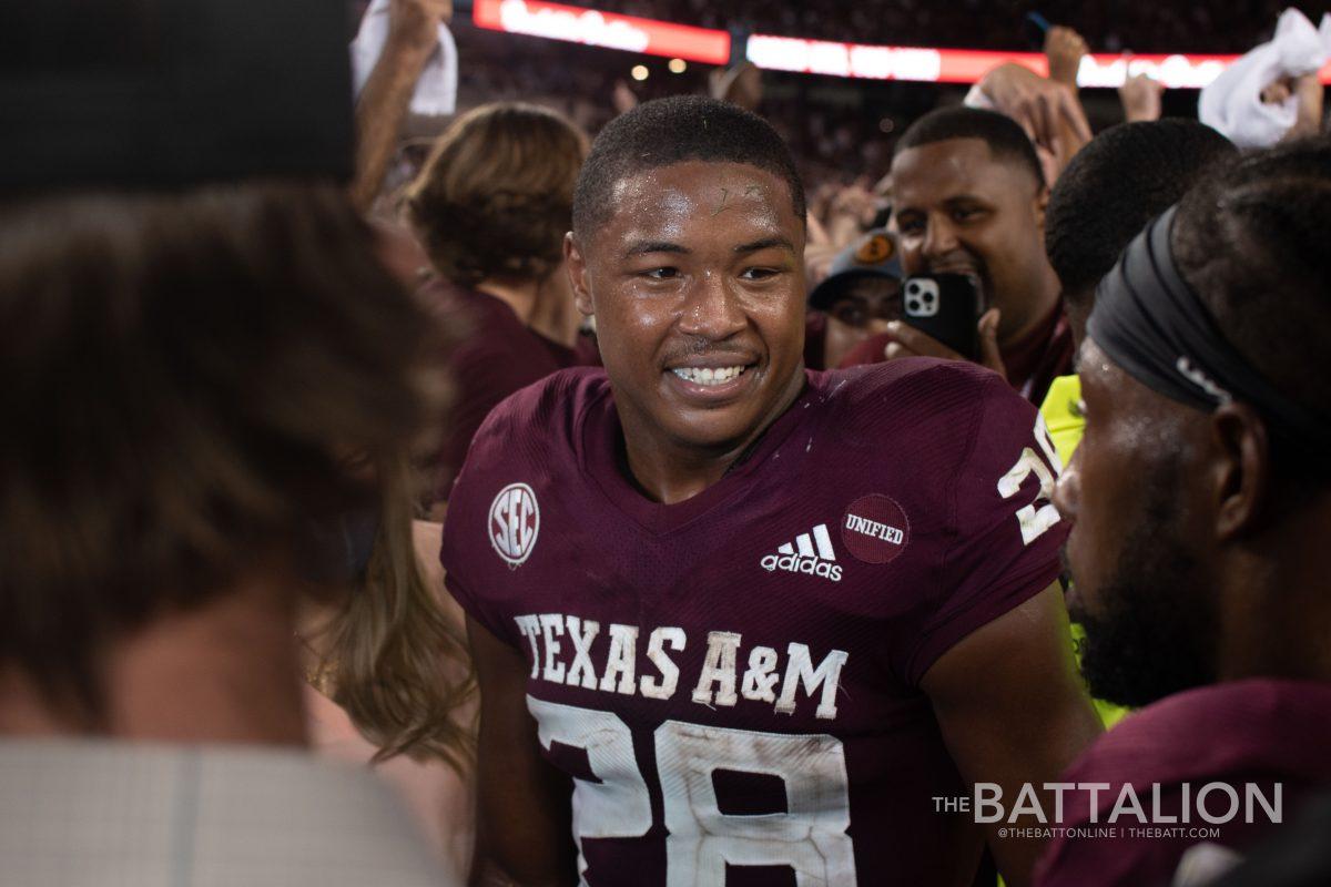 Running back Isaiah Spiller on the field following Texas A&Ms upset victory over Alabama.