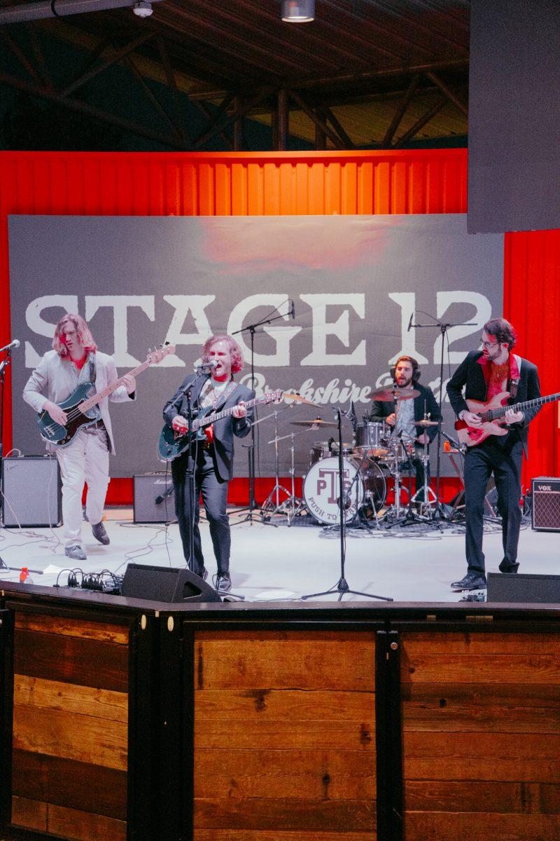 Cover band Push to start performs aon stage.