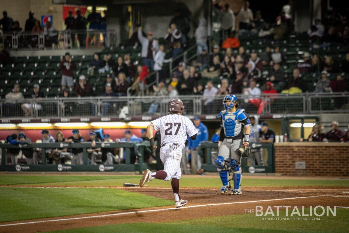 Graduate left fielder Dylan Rock (27) runs towards home at Blue Bell Park on Thursday, April 7, 2022.