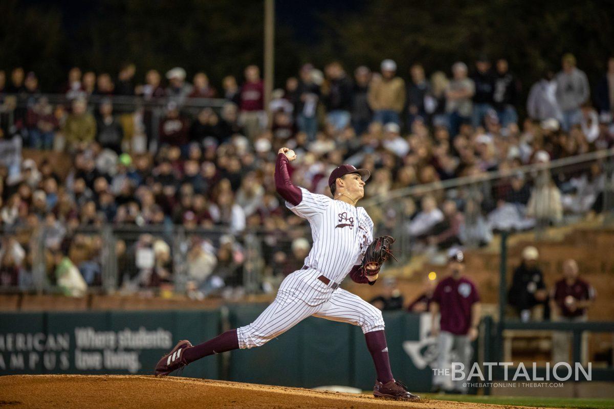 Sophomore pitcher Nathan Dettmer (35) throws a pitch in the first inning during the Aggies' game against Fordham at Blue Bell Park on Friday, Feb. 18, 2022.