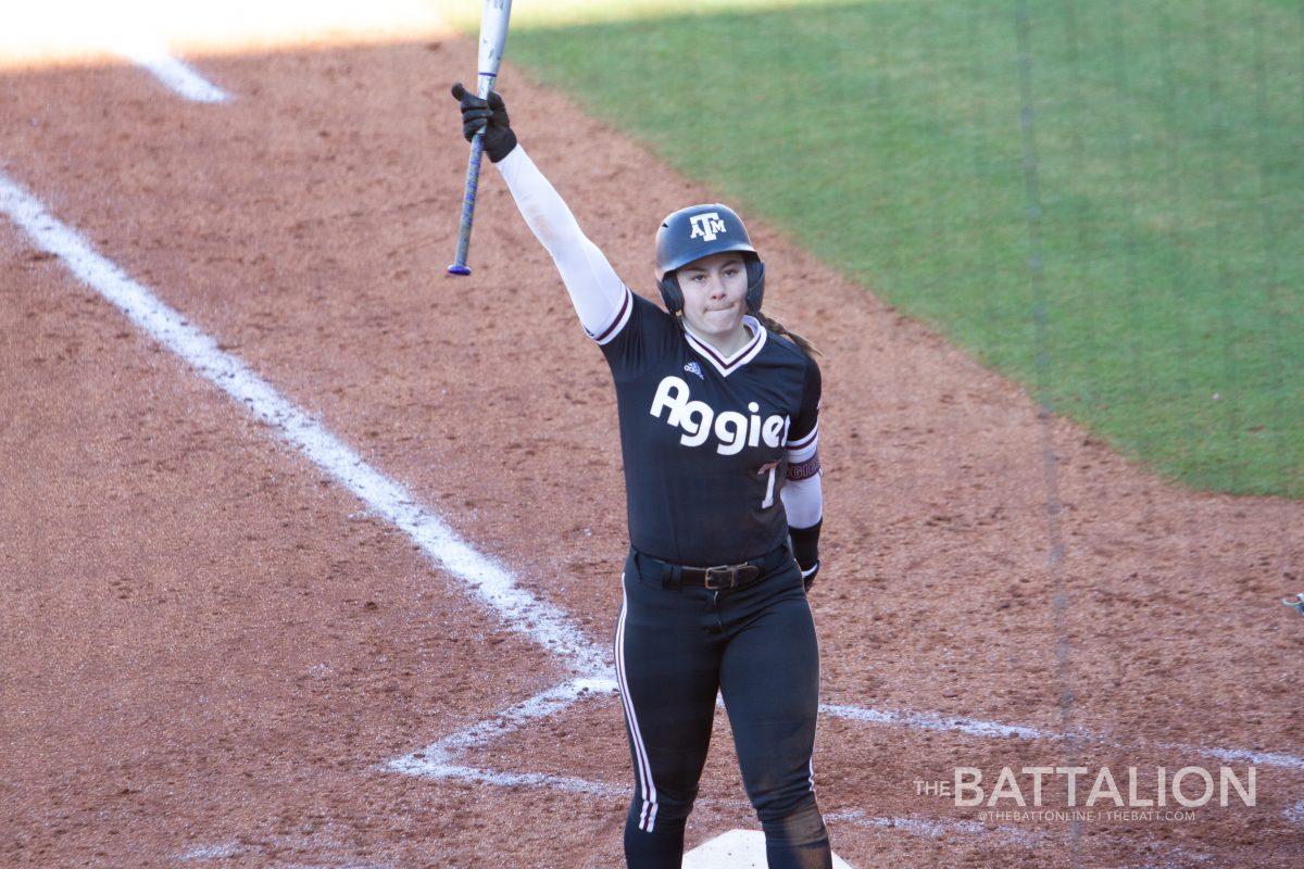 Freshman catcher and third baseman Katie Dack (7) at home plate in Davis Diamond on Friday, Feb. 18, 2022.