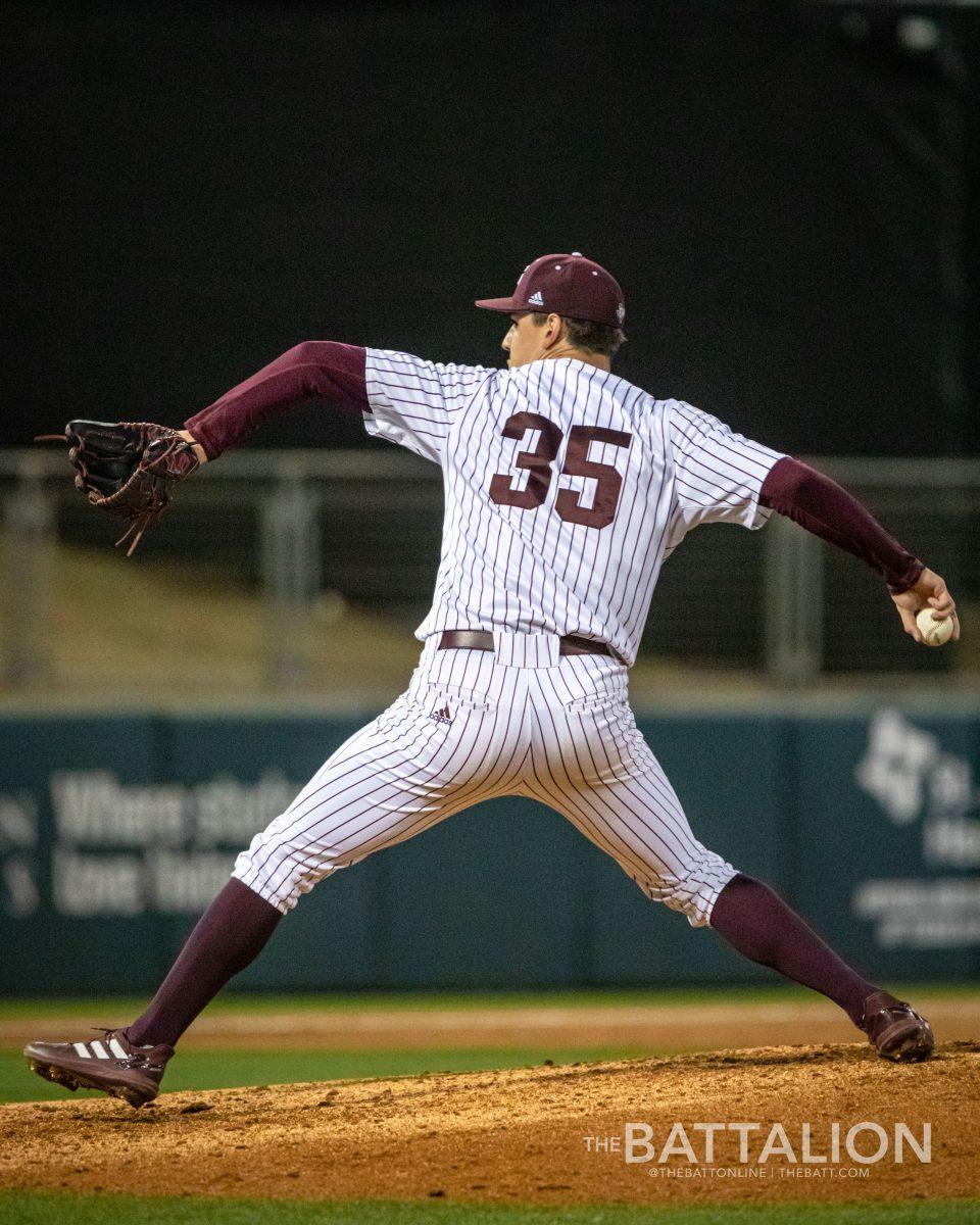 Sophomore pitcher Nathan Dettmer (35) throws a pitch during the fifth inning during the Aggies game against Fordham at Blue Bell Park on Friday, Feb. 18, 2022.