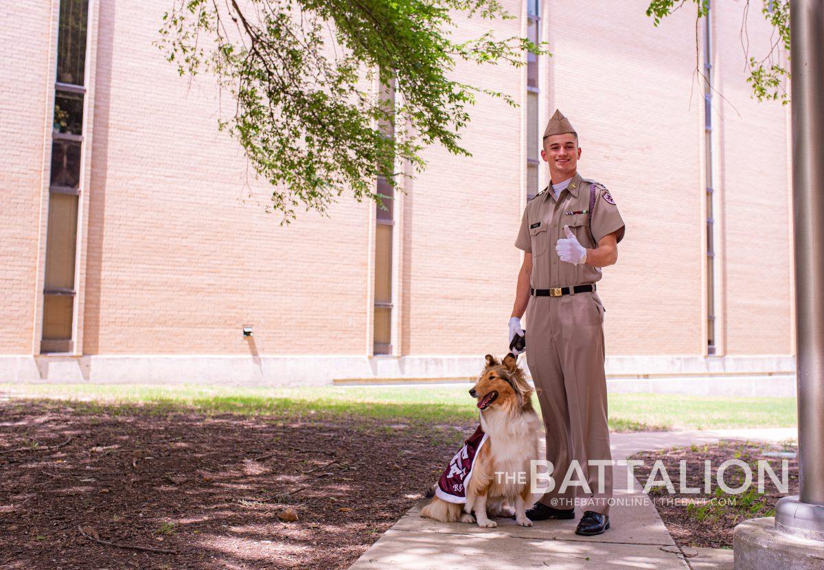 Reveille X sits next to her new handler Grayson Poage, Class of 2025 outside the Quad.&#160;