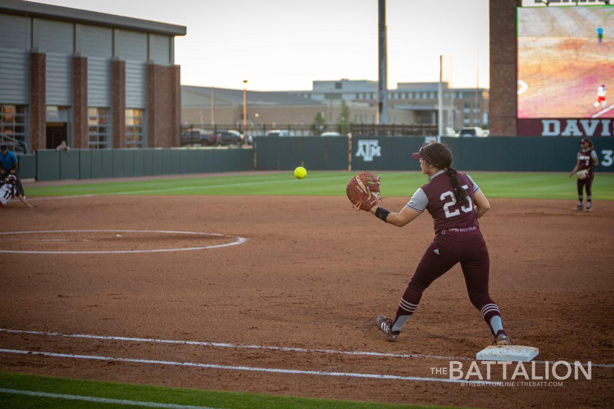 Senior C/UT Haley Lee (25) gets a runner out at first in Davis Diamond on Wednesday, April 27, 2022.