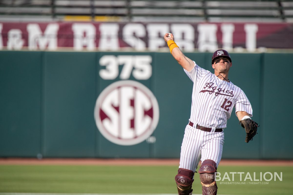 Senior C Troy Claunch (12) warms up before the start of the Aggies' game against Mississippi State at Olsen Field on Friday, May 13, 2022.