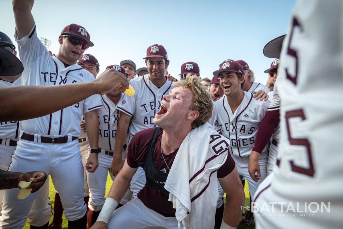 <p>Junior right fielder Brett Minnich (23) eats Pringle after hitting walk-off home run  to beat South Carolina 13-12 on Saturday, May 7.</p>