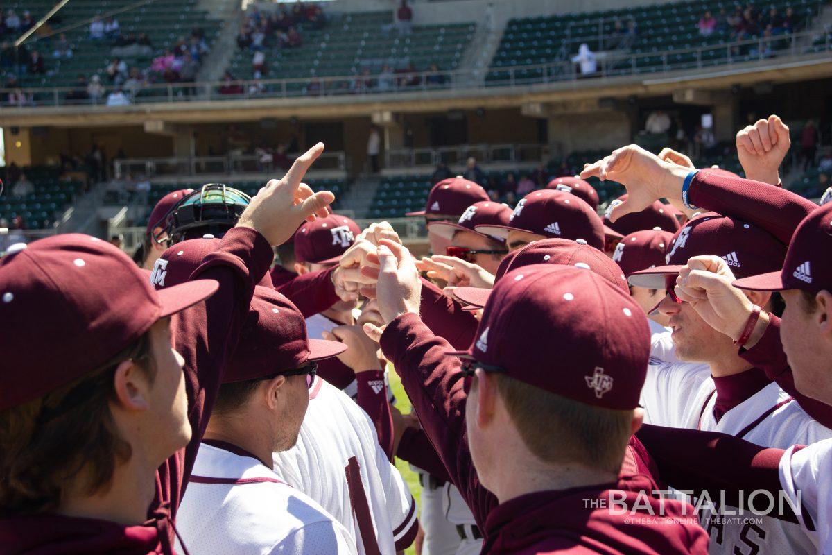 The Aggies prepare before their first game against Santa Clara at Olsen Field in Blue Bell Park on Saturday, March 12, 2022.