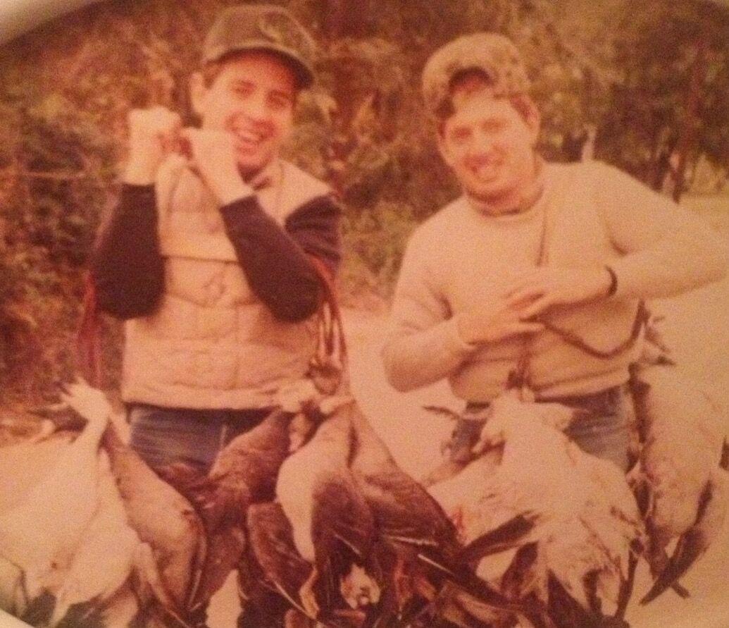 Brothers Pat McDonald (left), Class of 1985, and Dan McDonald (right), Class of 1986, pose for a photo during a day of hunting circa 1977.