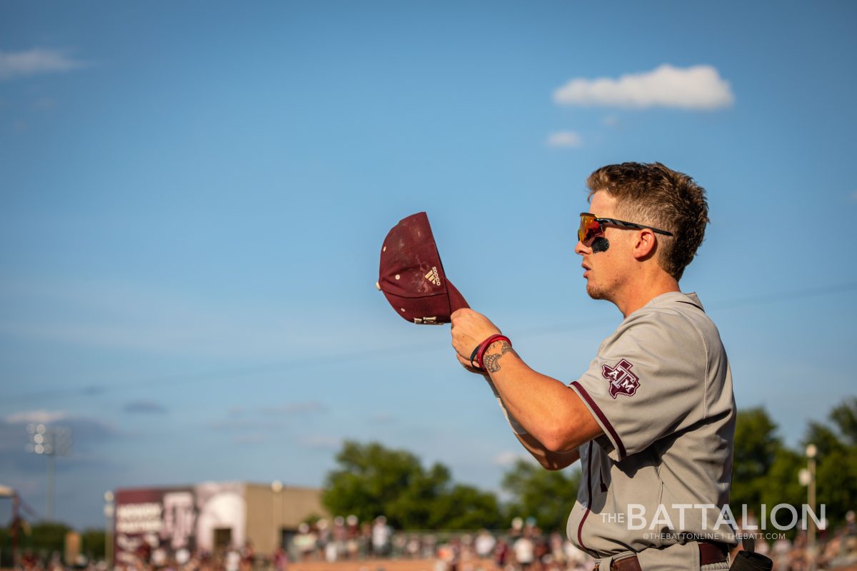 Graduate SS Kole Kaler (1) takes the field to stretch before the start of the Aggies' game against TCU at Olsen Field on Sunday, June 5, 2022.