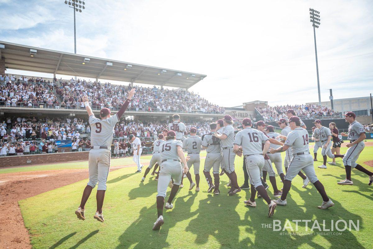 The Texas A&M baseball team celebrates advancing to College World Series on Saturday, June 11.