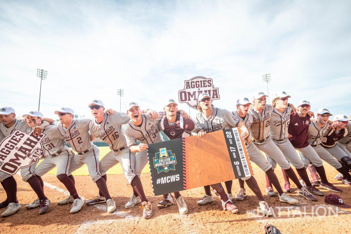 The Texas A&M baseball team holds up ticket to the College World Series after defeating Louisville, 4-3, on Saturday, June 11.