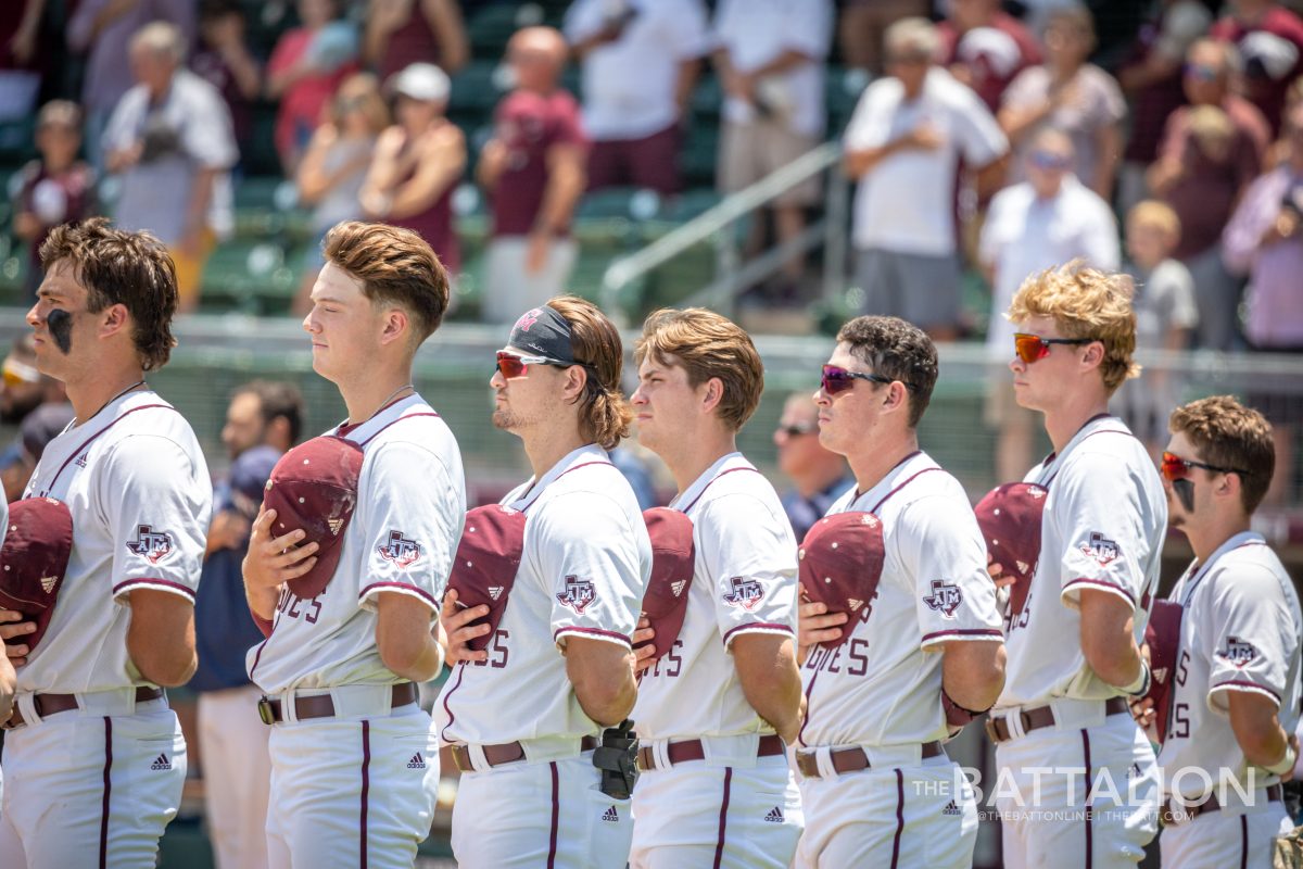 The+Aggies+starting+lineup+stands+for+the+National+Anthem+prior+to+the+start+of+their+game+against+Oral+Roberts+in+the+first+game+of+the+College+Station+Regional+at+Olsen+Field+on+Friday%2C+June+3%2C+2022.