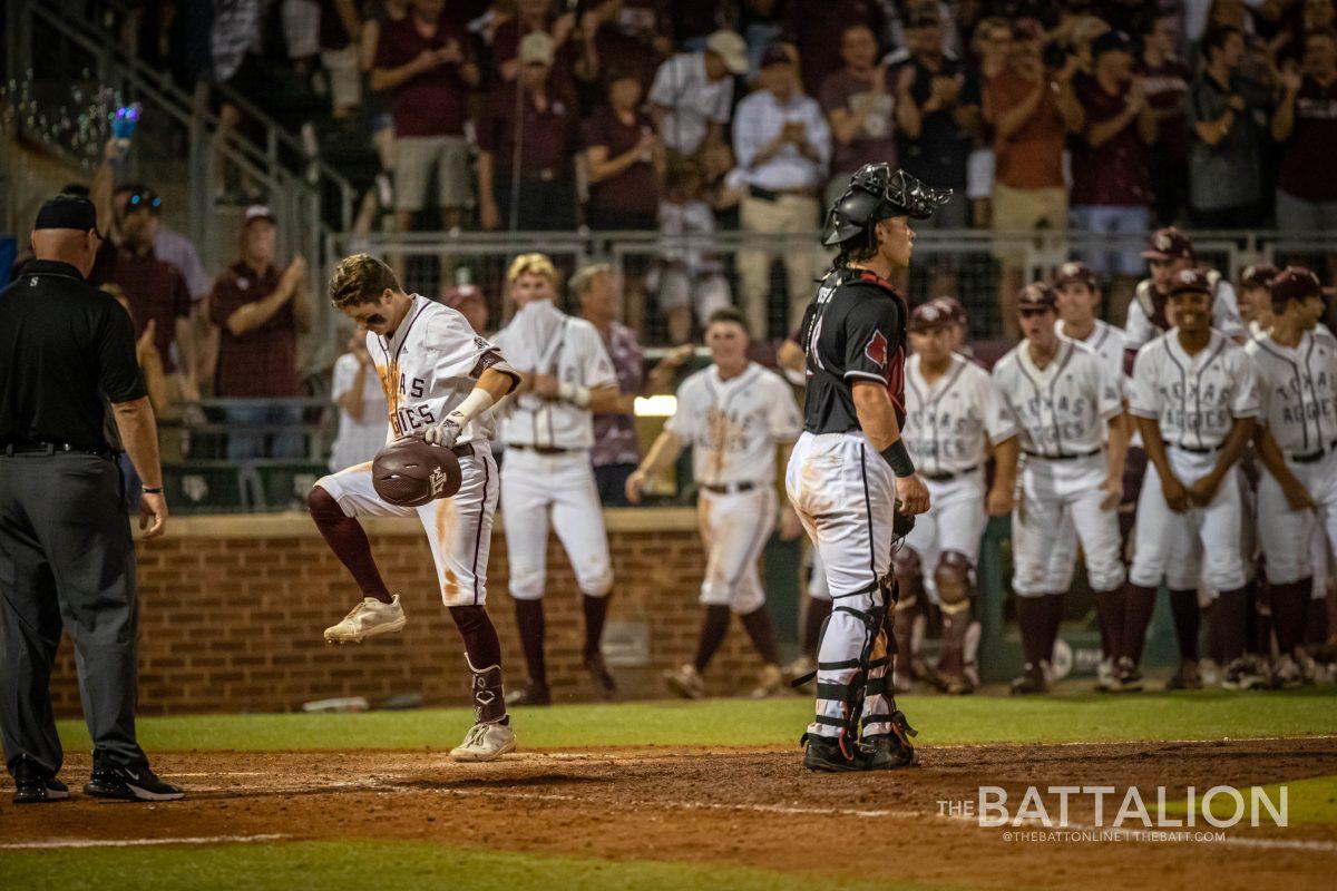 <p>Junior CF Jordan Thompson (31) stomps his foot on home plate after hitting a game-tying home run at Olsen Field on Friday, June 10, 2022.</p>