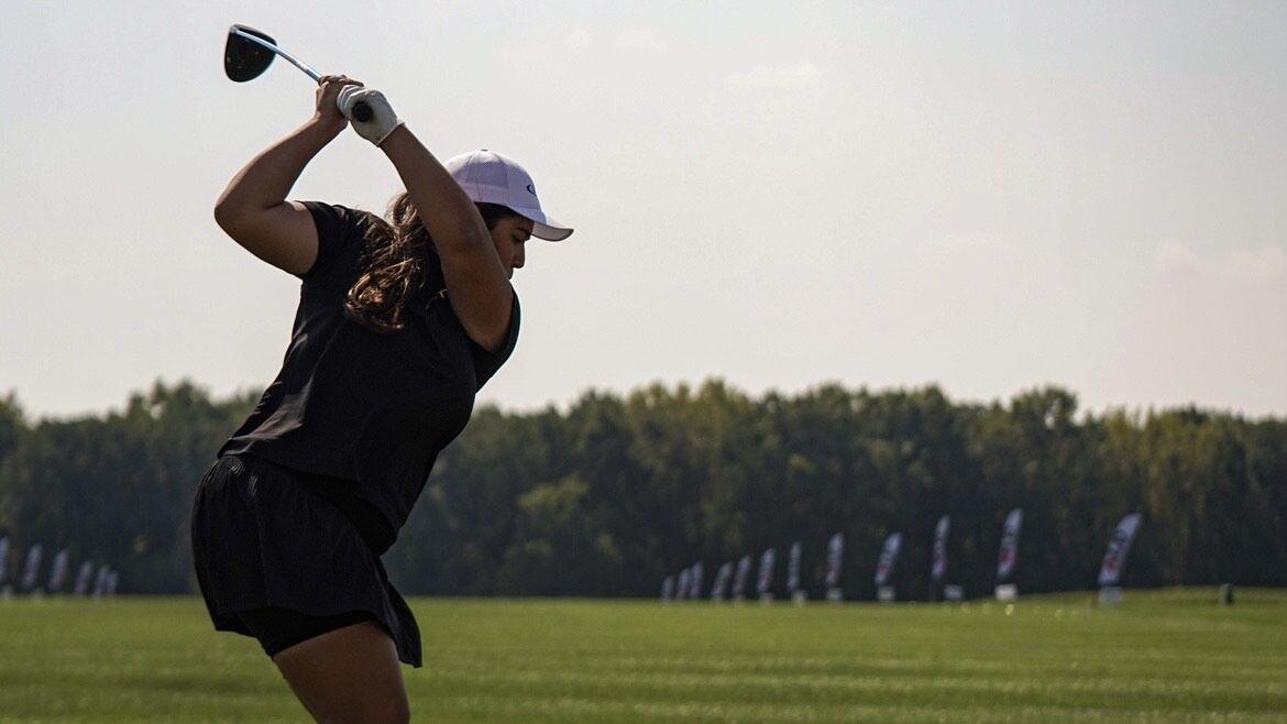 <p>Material engineering senior <strong>Katherine Calderon </strong>mid-swing during the 2021 Long Drive World Championship on Sep. 18, 2021. Calderon uses her engineering prowess to showcase her golfing lifestyle, earning a significant following on TikTok as @Clubgirlkatie.</p>