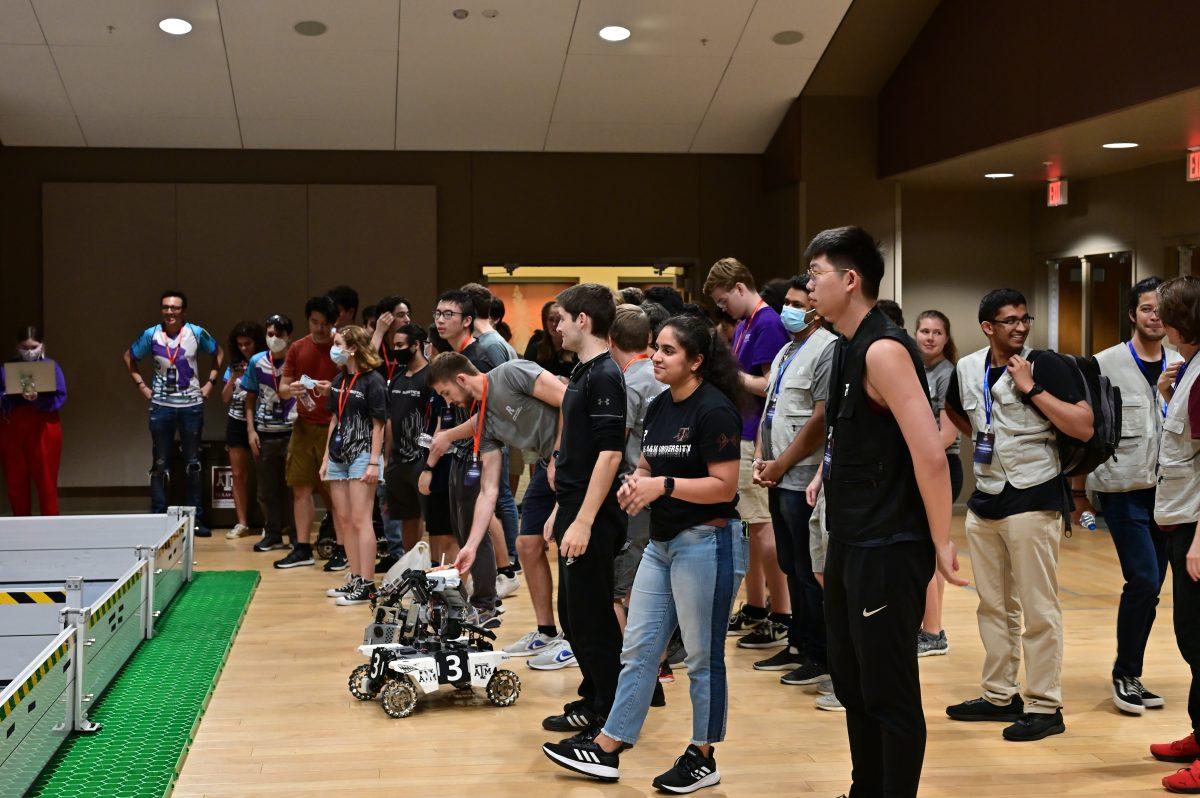 Participants and spectators of the 2021 TAMU Robomasters Lone Star Competition gather to watch their robots compete in the Bethancourt Ballroom of the Memorial Student Center.