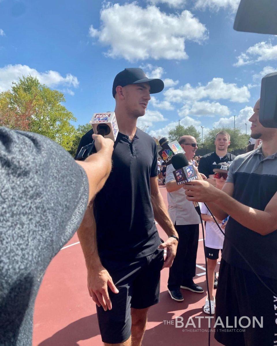 Alex Caruso, guard for the Chicago Bulls and former student of Texas A&M University, talking to reporters during the opening ceremony of the Alex Caruso Court at Castlegate Park in College Station, Sunday, July 30, 2022.