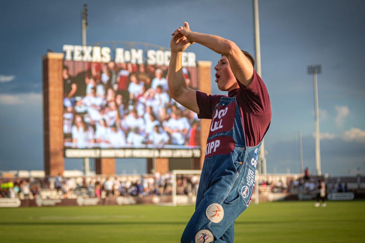 Senior Yell Leader Kipp Knecht leads the Aggies in a yell before the start of the Fish Camp soccer game between the Aggies of Texas A&amp;M and the Aggies of New Mexico State at Ellis Field on Saturday, Aug. 27, 2022.