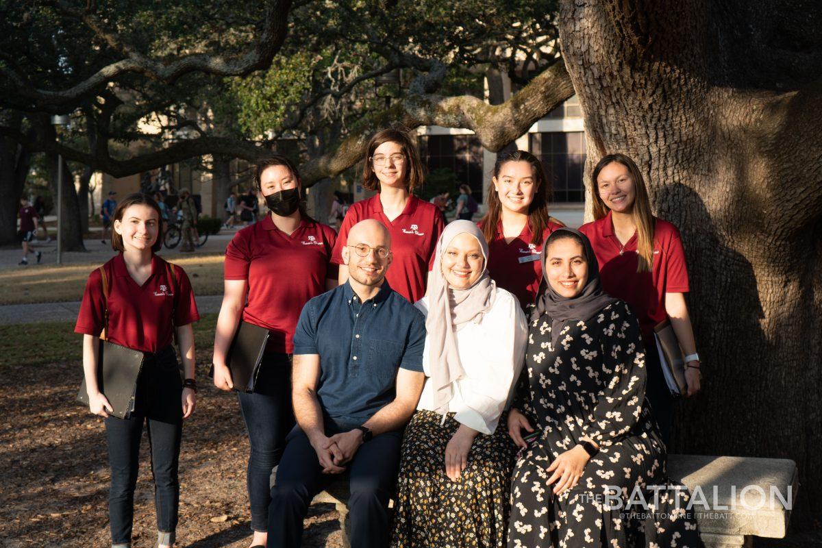 The Texas A&M Womens Chorus performed underneath the Century Tree for Buthayna Al Dagher on Feb. 22, 2022.
