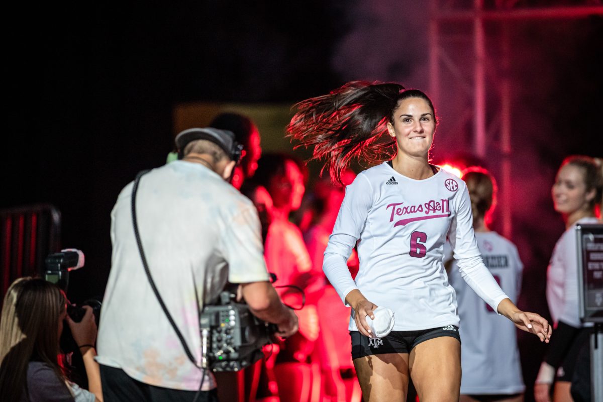 Graduate S Elena Karakasi (6) runs out before the start of the Aggies match against San Diego on Saturday, Aug. 27, 2022 at Reed Arena.