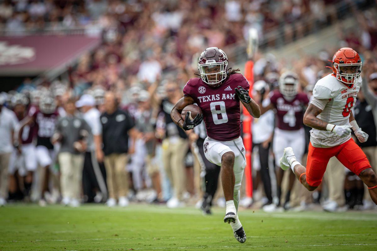 Sophomore WR Yulkeith Brown (8) completes a pass from sophomore QB Haynes King (13) during the Aggies game against Sam Houston State at Kyle Field on Saturday, Sept. 3, 2022.