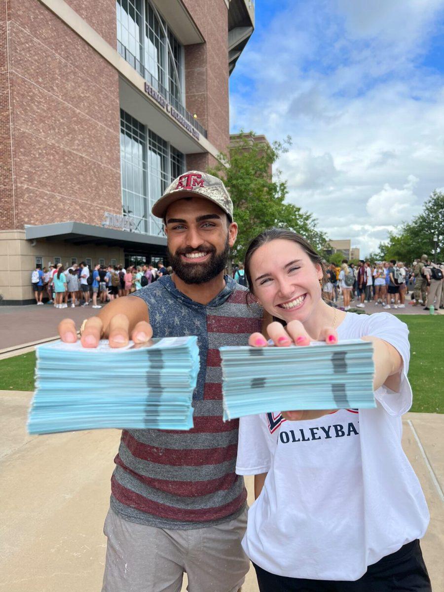 Impact Camp’s Michael Mubarak and Katie Hayes at ticket pull on Monday, Aug. 29 after pulling a total of 653 tickets.