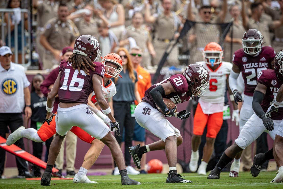 Sophomore+DB+Jardin+Gilbert+%2820%29+intercepts+a+ball+thrown+by+Sam+Houston+State+QB+Jordan+Yates+%2813%29+during+the+Aggies+game+against+Sam+Houston+State+at+Kyle+Field+on+Saturday%2C+Sept.+3%2C+2022.