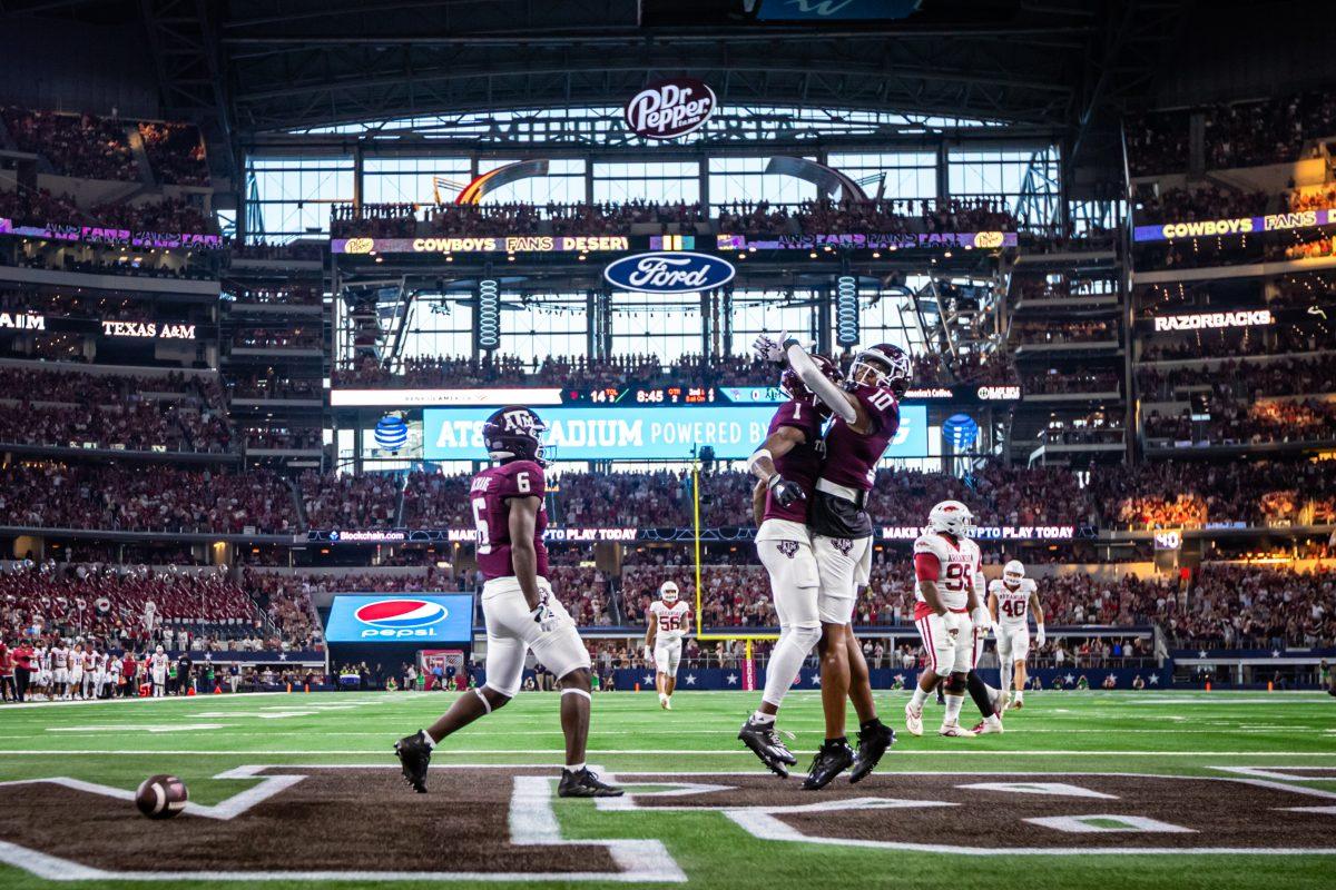 Freshman WR Evan Stewart (1) celebrates in the end zone with freshman WR Chris Marshall (10) after Stewart scored the Aggies first touchdown of the game and the first of his college career during the Southwest Classic on Saturday, Sept. 24, 2022, at AT&T Stadium in Arlington.