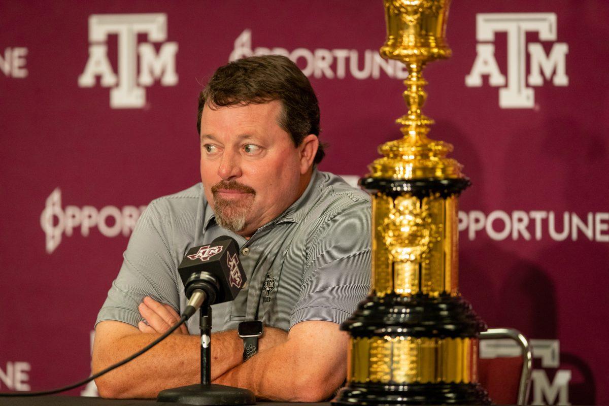 Texas A&M mens golf coach Brian Kortan questions at a press conference at Kyle Field after returning to College Station following Sam Bennets win at the US Amateur Championship.