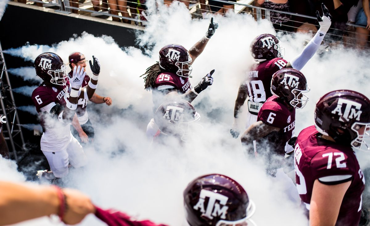 Micaiah Constantinou (95) and the Texas A&amp;M football team enter Kyle Field on Saturday, Sept. 10, 2022.