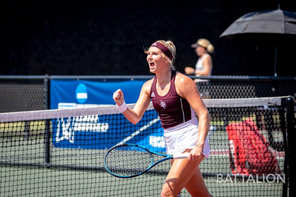 Senior Jayci Goldsmith celebrates after winning her singles match in the Sweet Sixteen of the NCAA DI Womens Tennis Championship tournament.