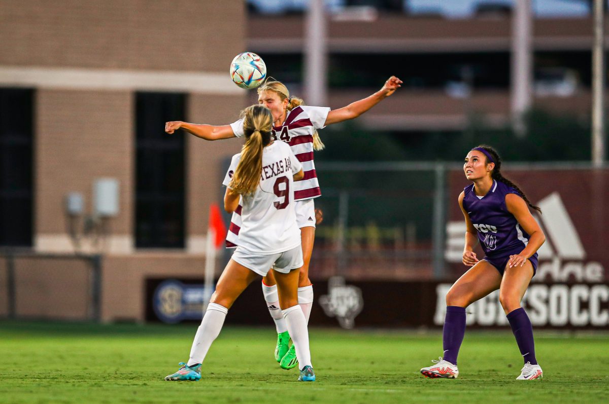 Sophomore middle fielder Quinn Cornog (34) head-balls the ball after the TCU goalie kicks it up the feild at Ellis Field on Thursday, Sept. 8, 2022.