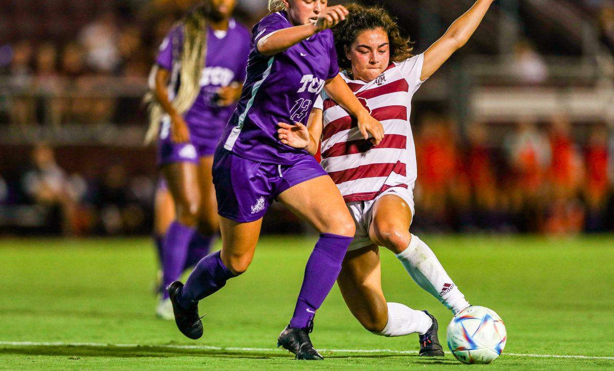 Sophomore forward Maile Hayes (8) kics the ball to her teammate at Ellis Field on Thursday, Sept. 8, 2022.