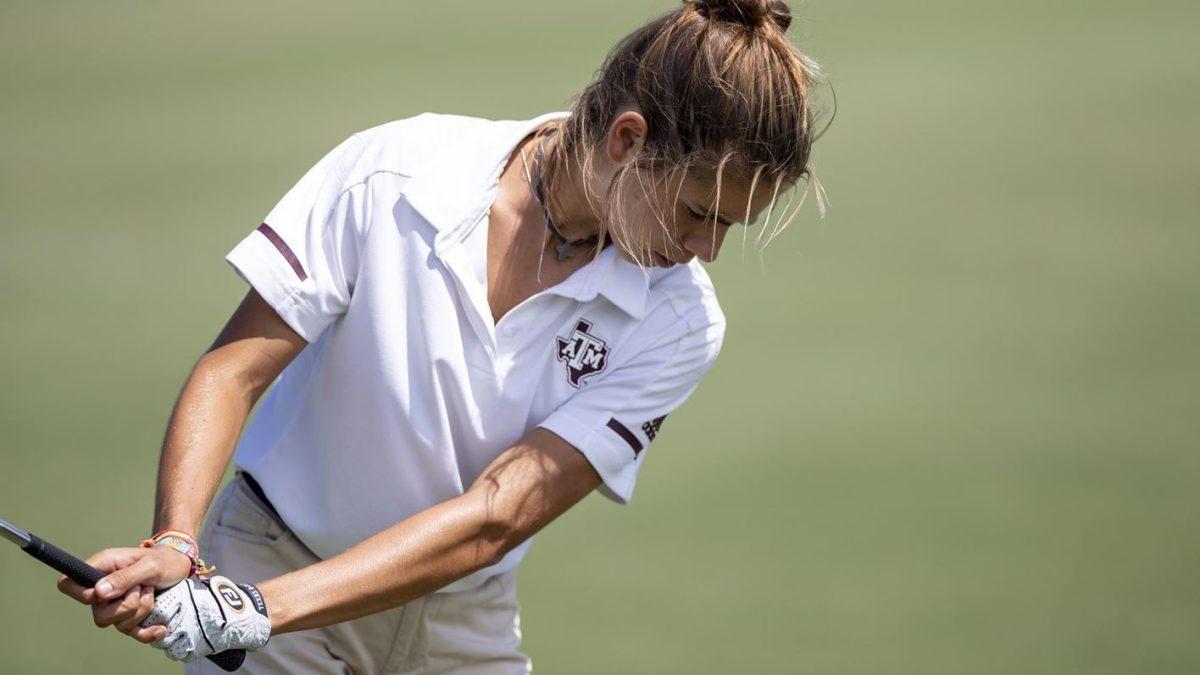 <p>Texas A&M women's golf junior <span><strong>Fernández García-Poggio </strong>swings at the ball.</span></p>