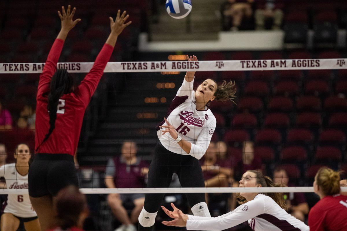 Graduate student OH Caroline Meuth (16) hits the ball at Reed Arena on Friday, Sep. 2, 2022.
