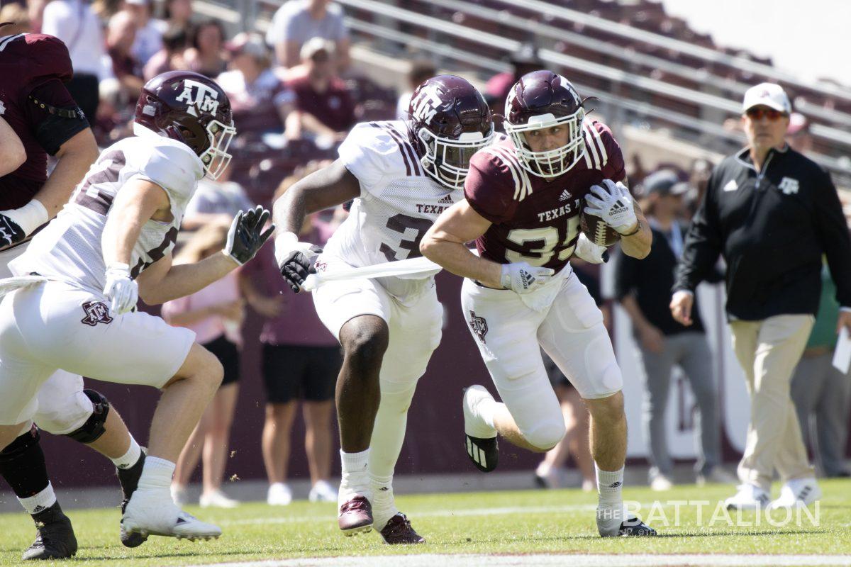 Junior RB Bladen Reaves (35) avoids a tackle during the Maroon & White Spring Game at Kyle Field on April 9, 2022.