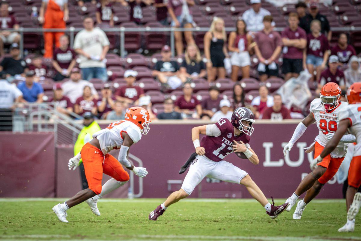 Sophomore QB Haynes King (13) rushes down the field during the Aggies game against Sam Houston State at Kyle Field on Saturday, Sept. 3, 2022.