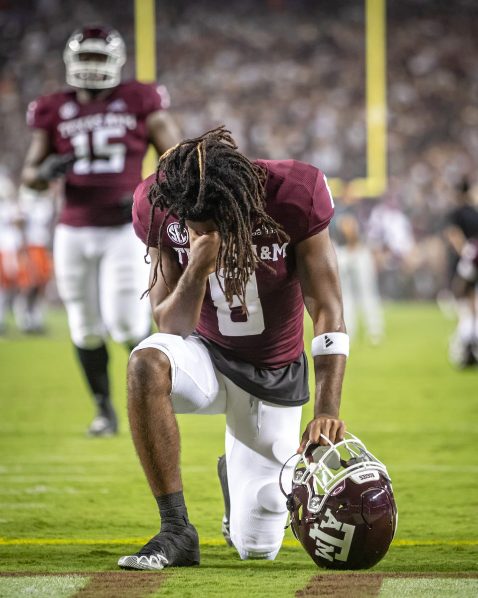 Freshman WR Yulkeith Brown (8) kneels in the end zone before the start of Texas A&Ms game against Miami at Kyle Field on Saturday, Sept. 17, 2022.