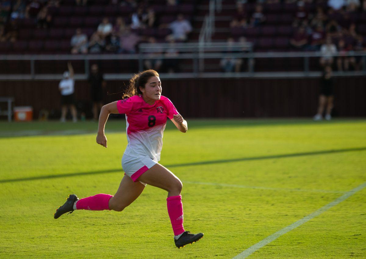 <p>Sophomore Forward Maile Hayes (8) racing to the goal during Texas A&M's match against against Missouri at Ellis Field on Sunday, Oct. 23, 2022.</p>