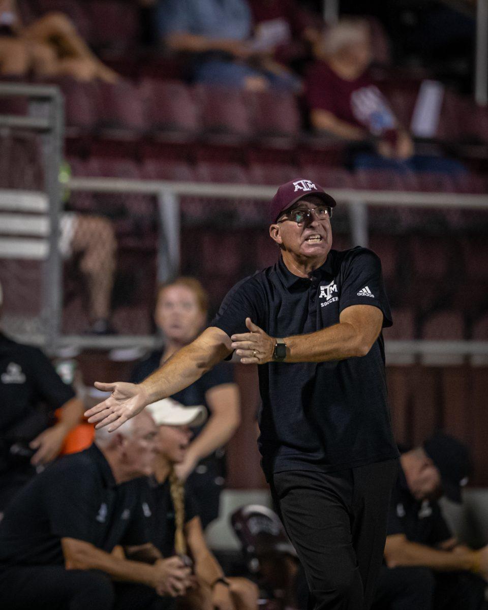 A&M coach G Guerrieri reacts after a replay is shown during the Aggies match against Mississippi State at Ellis Field on Thursday, Sept. 22, 2022.