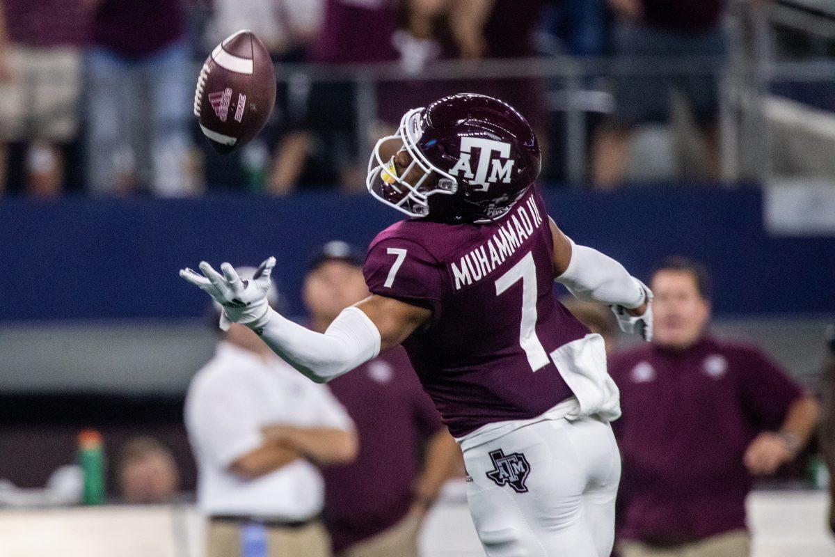 <p>Sophomore WR Moose Muhammad III (7) drops the ball during the Southwest Classic on Saturday, Sept. 24, 2022, at AT&T Stadium in Arlington, Texas.</p>