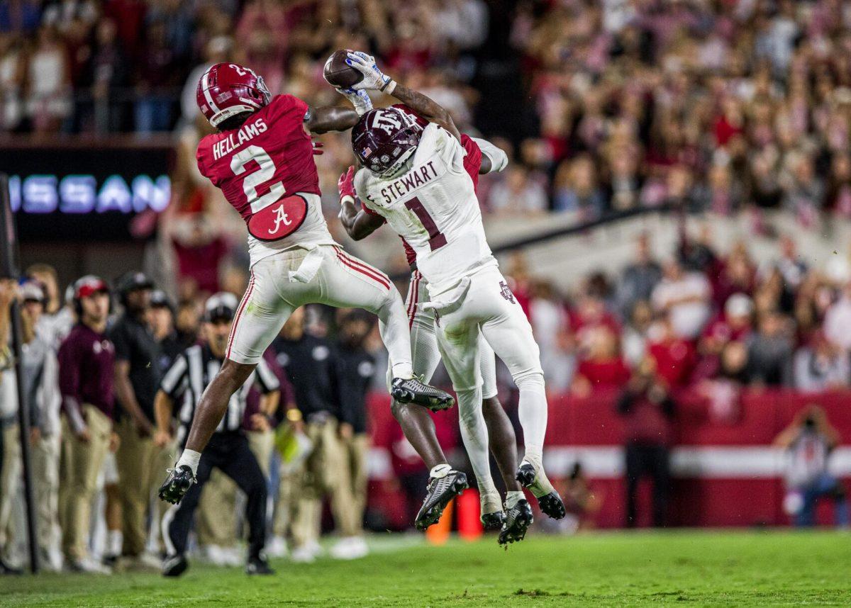 Freshman WR Evan Stewart (1) catches a 23 yard pass from sophomore QB Haynes King (13) during a game against the Alabama Crimson Tide on Saturday, Oct. 8, 2022, at Bryant-Denny Stadium in Tuscaloosa, Alabama.